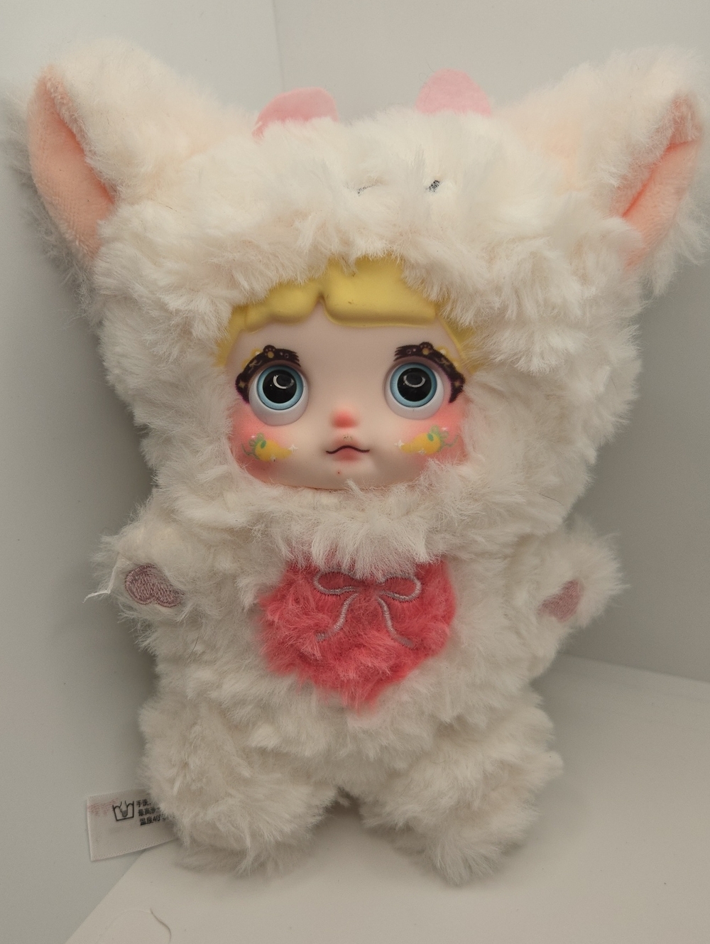 White Plush Nommi Doll with Color Changing Eyes